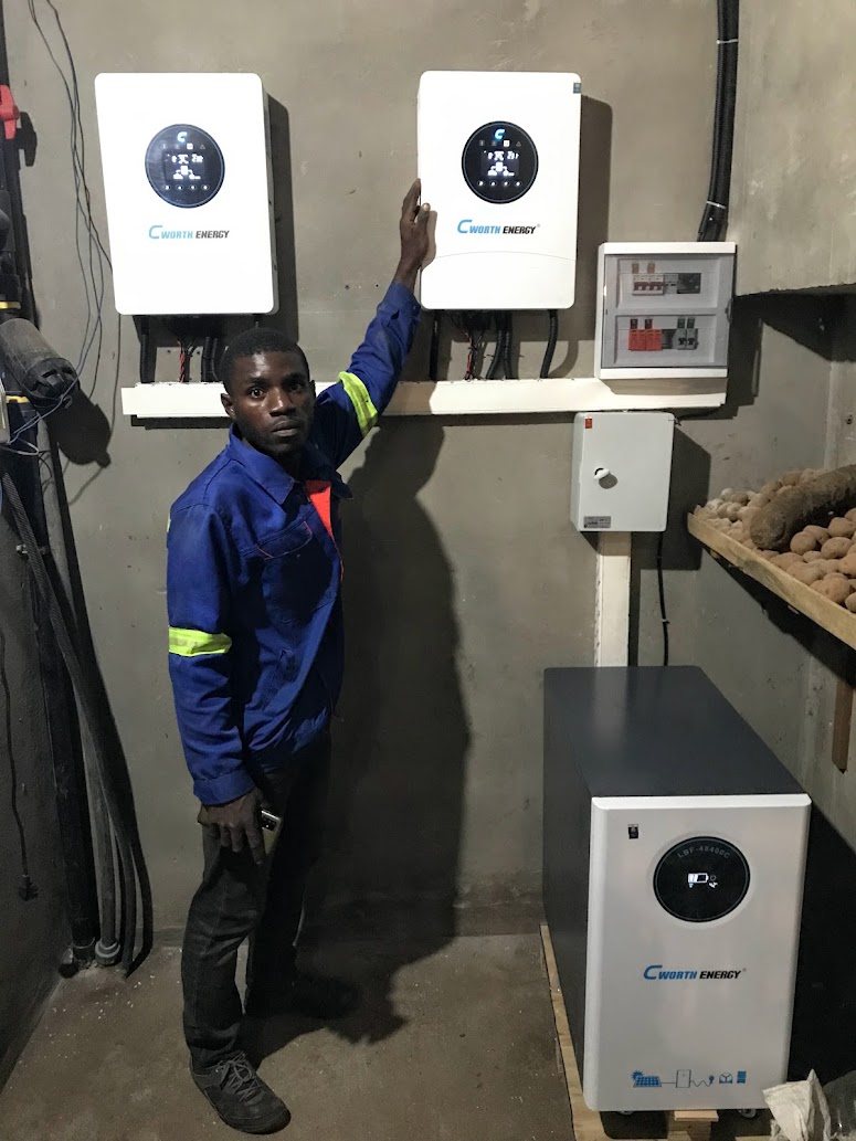 SmartSana technician checking a home’s inverters