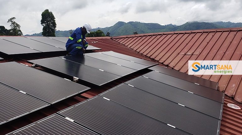 SmartSana technician installing the panels, Bandja