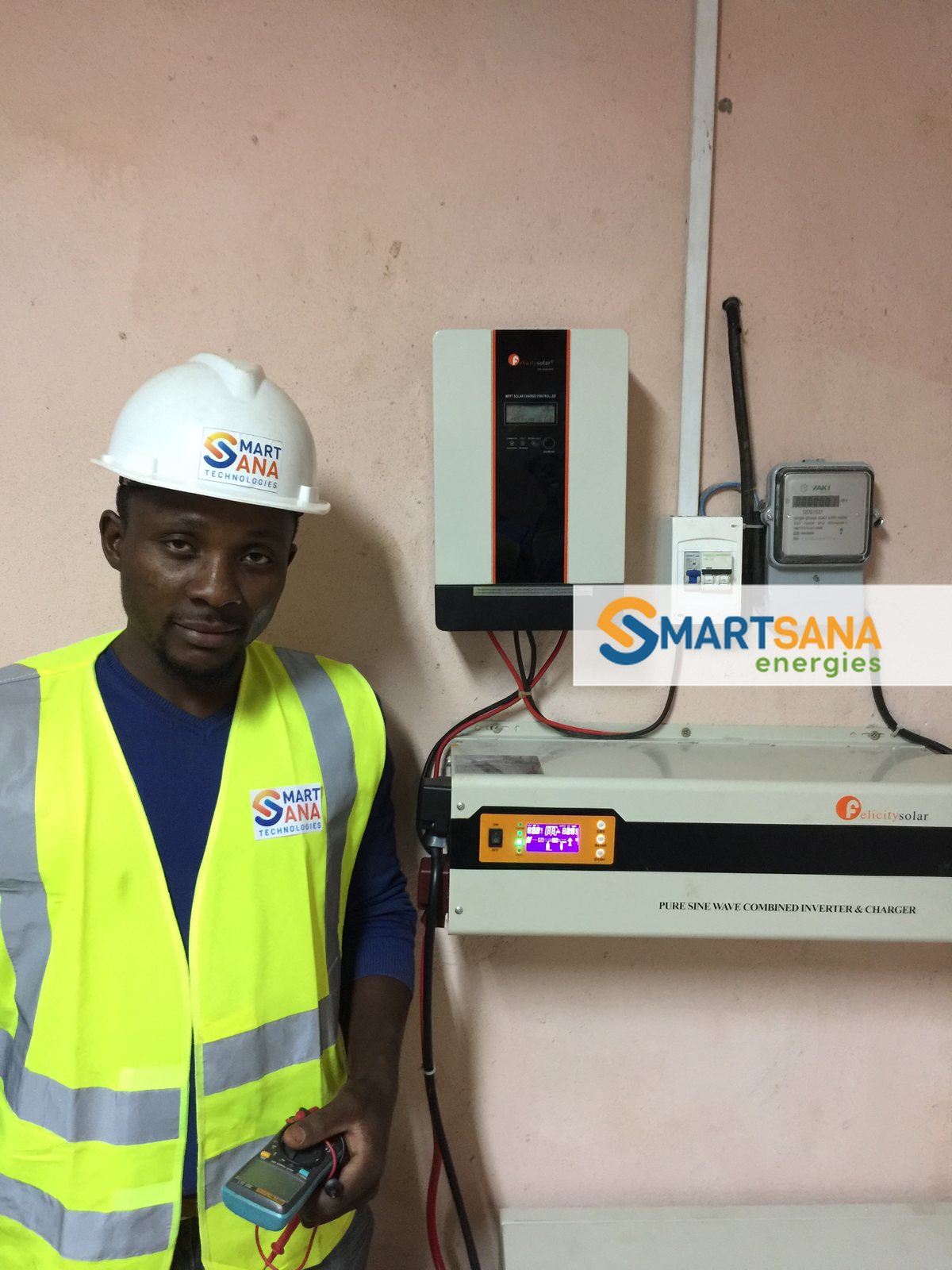 SmartSana technician commissioning the 7.5 kVA inverter