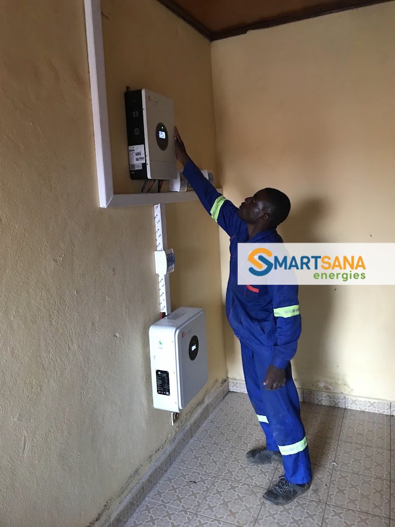 Technician checking the Felicity Solar inverter