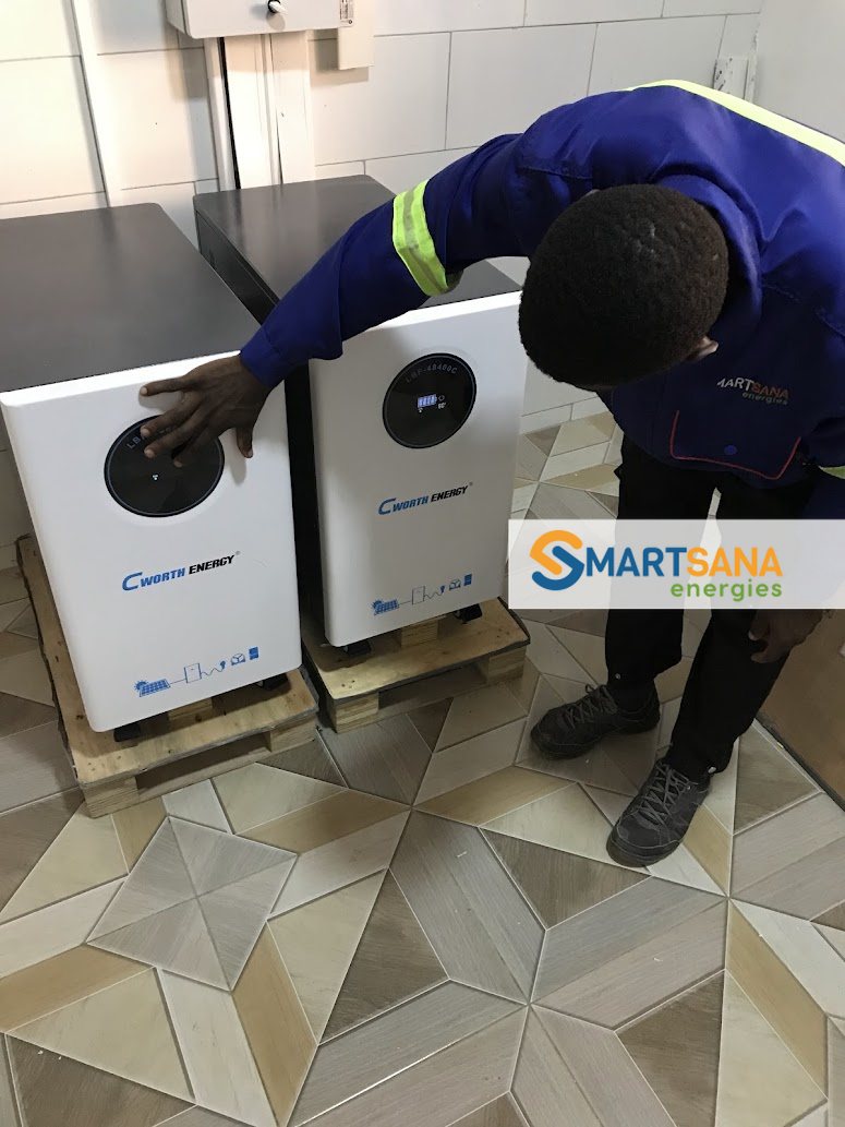 Technician installing a battery